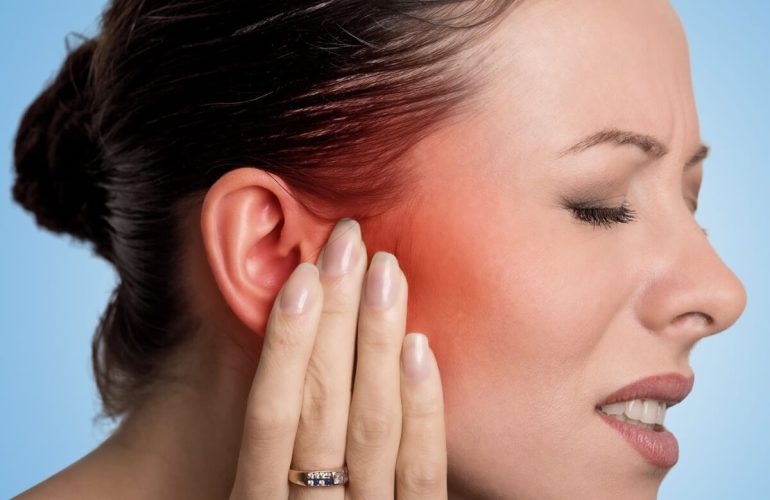 Mujer con Dolor mandibular Orthokinétika Maxia
